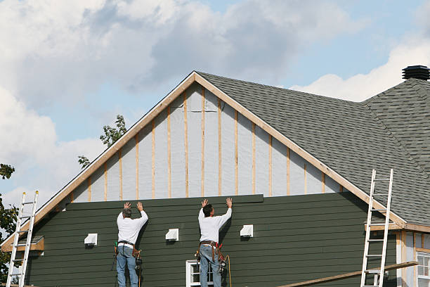 Professional Siding technician working in Graysville, PA
